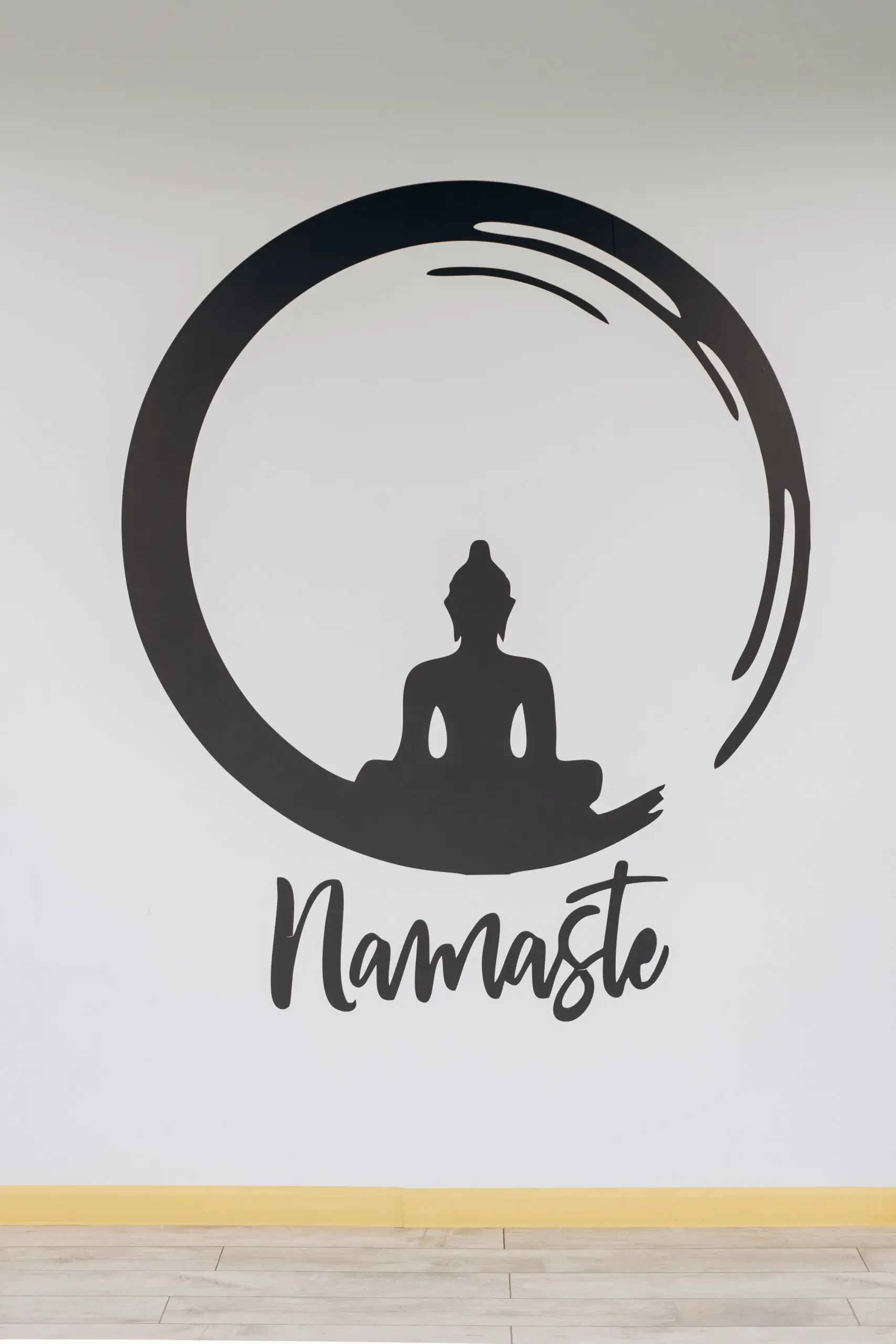 Namaste sign on wall